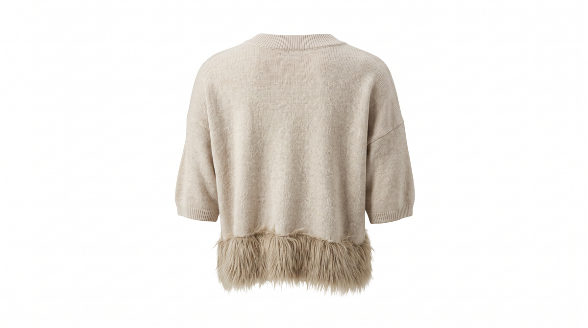 A light beige knit sweater with a fuzzy faux-fur hem detail, shown from the back